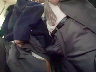 Horny schoolgirl gets grabby with businessman's dick on public transport.